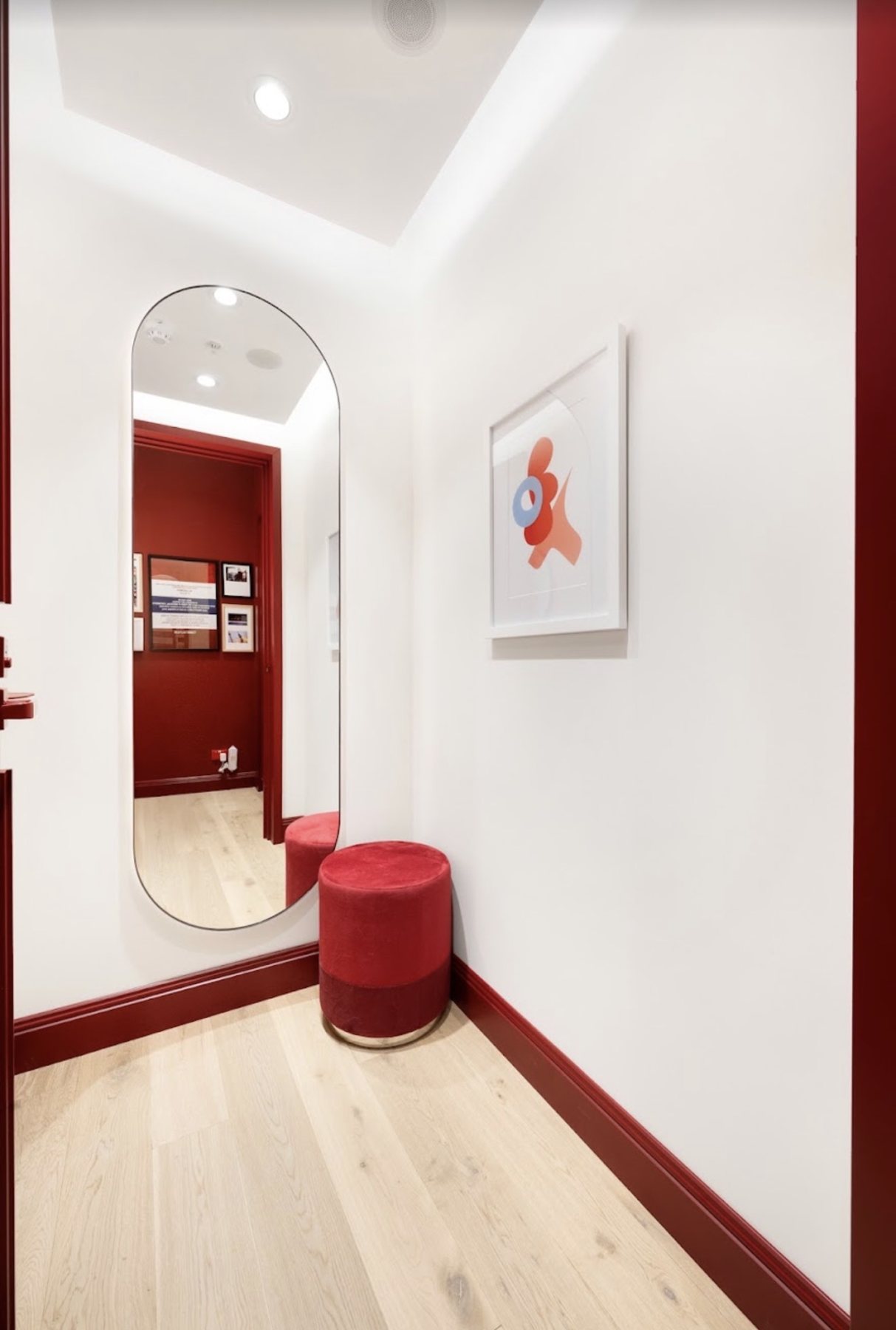 Fitting room with white walls and red trims, Tommy Hilfiger Chatswood Chase