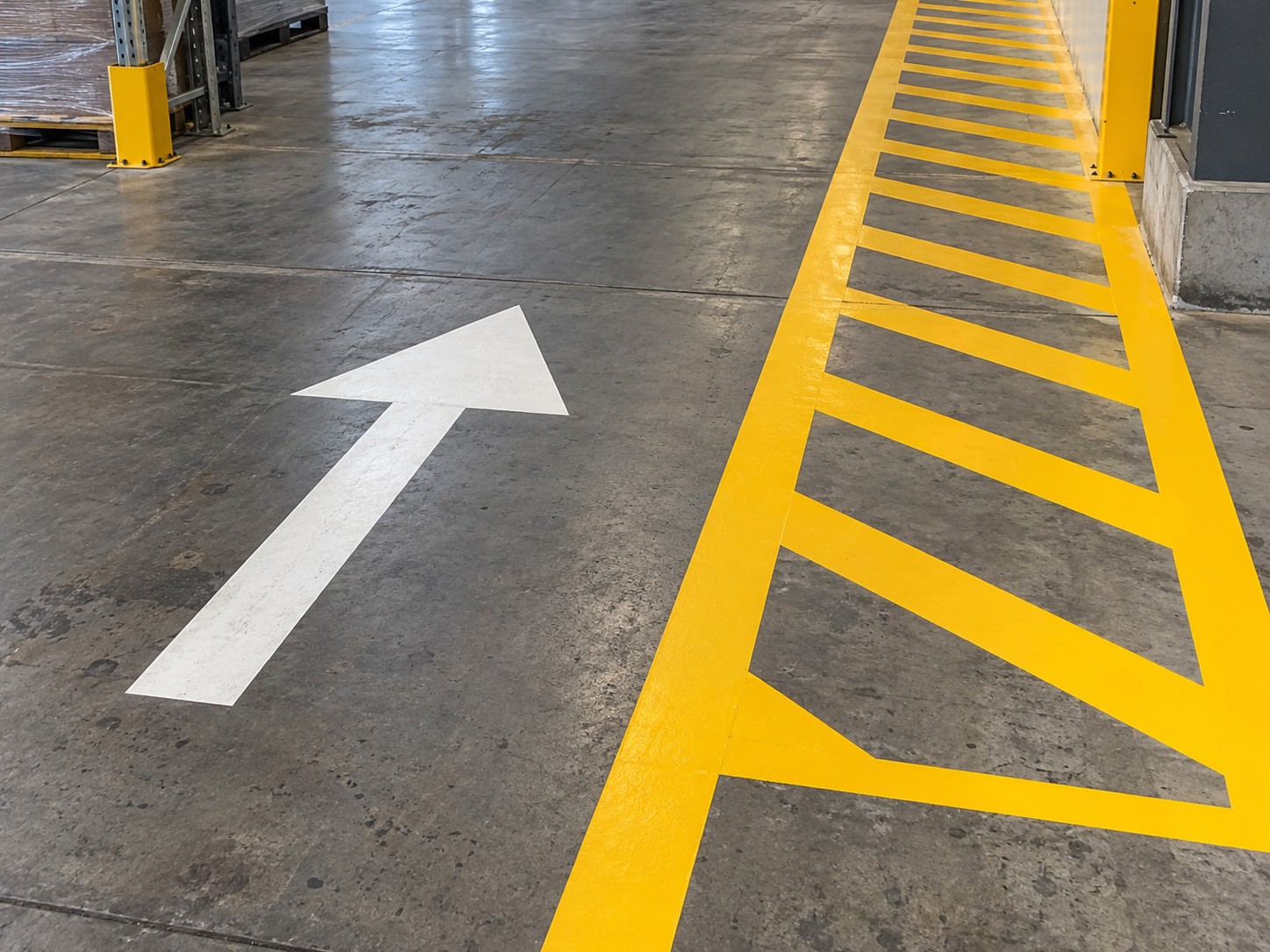 Warehouse arrow and pedestrian walkway marking