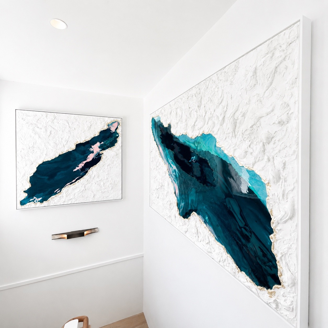 Paired feature artworks installed in a stairwell