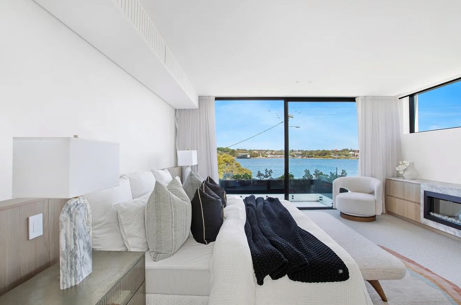 Bright bedroom with water views