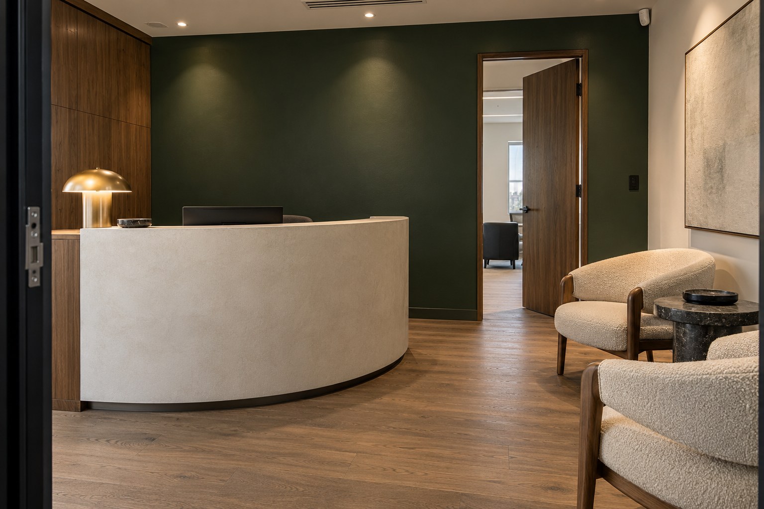Office reception with a deep green feature wall