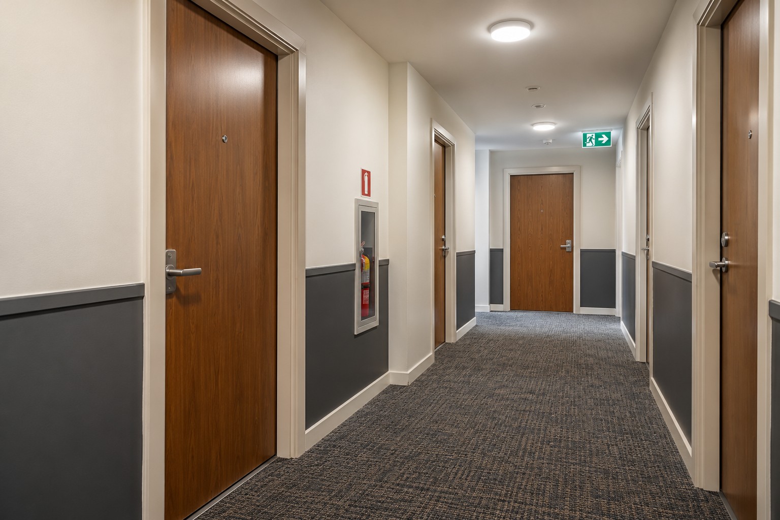 Finished strata corridor with apartment doors