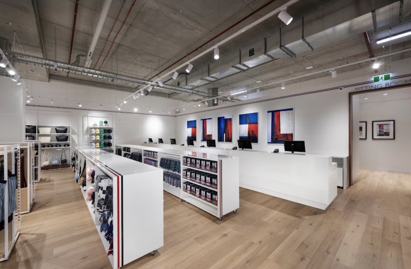 Tommy Hilfiger store interior with white walls and counters, Liverpool
