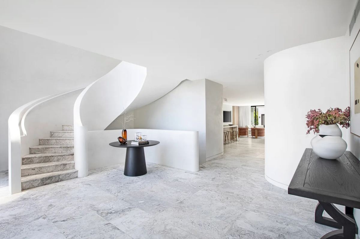 Entrance foyer with curved rendered staircase, Russell Lea